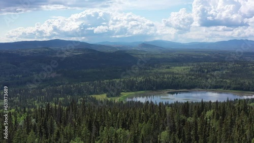 Unspoiled Wilderness: The Forests and Mountains of Smithers, BC Seen from Above photo