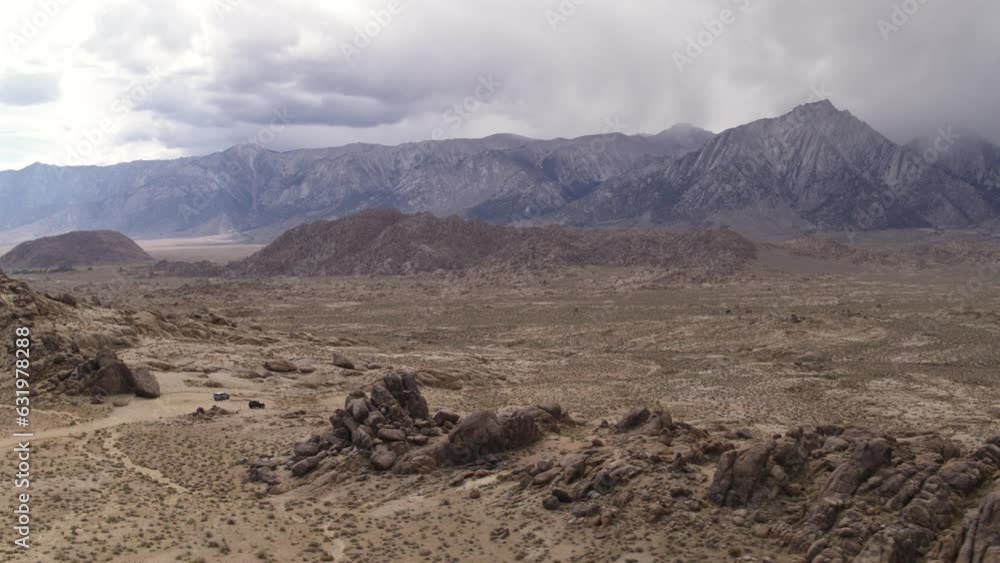 Wide Drone Aerial above the Alabama Hills of California, Sierra Nevada Mountain Range in the background Wide Drone Aerial above the Alabama Hills of California, Sierra Nevada Mountain Range in the background