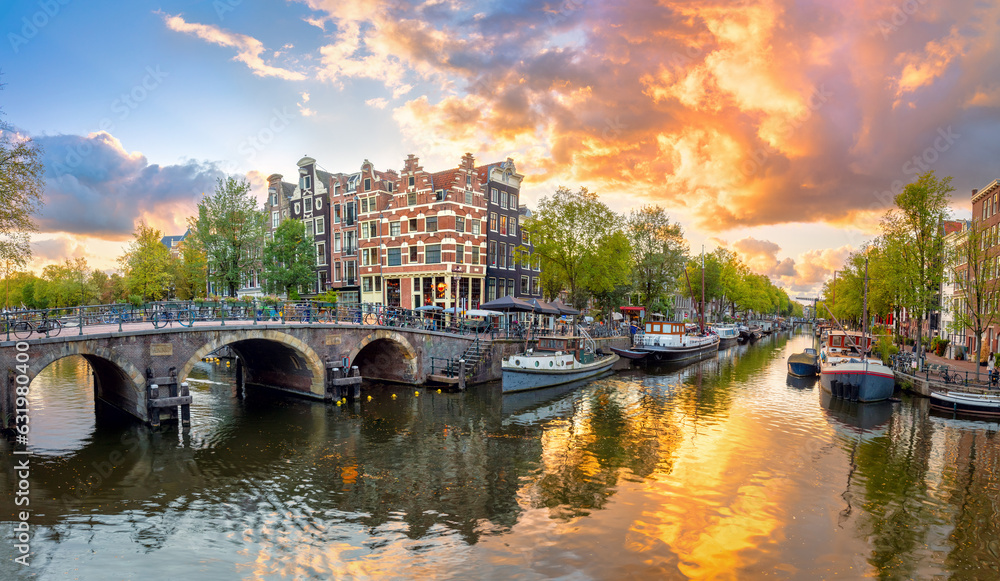 Amsterdam. Panoramic view of the downtown of Amsterdam. Traditional houses and bridges of Amsterdam. Europe, Netherlands, Holland, Amsterdam.