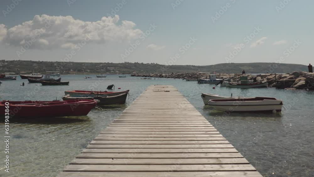 small harbour with boats in greece small harbour with boats in greece