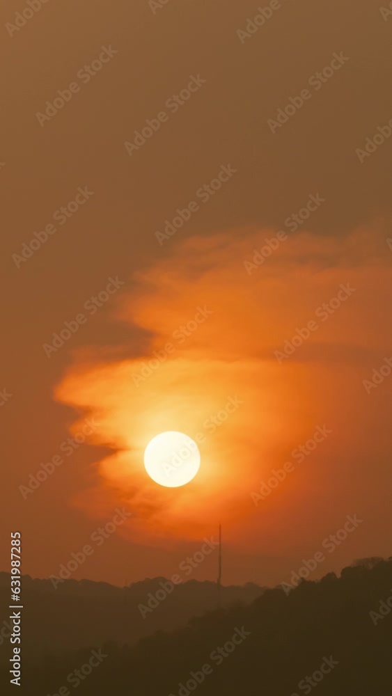 Timelapse of dramatic sunrise with orange sky in a sunny day. Timelapse of dramatic sunrise with orange sky in a sunny day.
