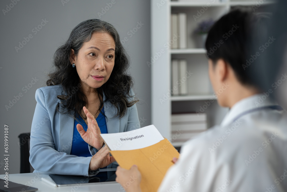 Office worker sends resignation letter to employer Regarding resignation, change of position But the boss did not want to resign, feeling the pressure. concept of resignation, unemployment, change Office worker sends resignation letter to employer Regarding resignation, change of position But the boss did not want to resign, feeling the pressure. concept of resignation, unemployment, change