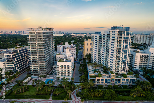 Miami Beach  Florida  USA - Morning aerial view of luxury condominiums with the Miami skyline in the distance.