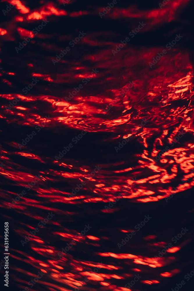 Liquids in motion. Abstract red background