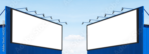 Mock up white background billboard on blue building with spot light photo