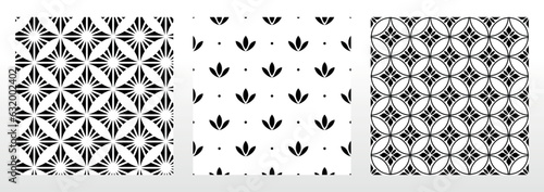 Geometric floral set of seamless patterns. White and black vector backgrounds. Damask graphic ornaments.