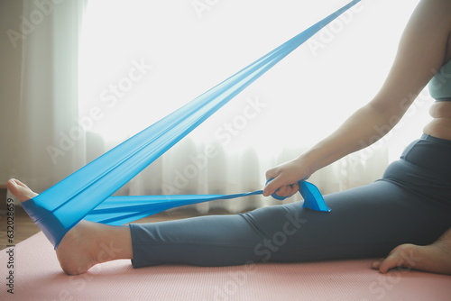 Close up image of attractive fit woman in gym