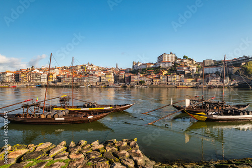 Porto Portugal, city skyline at Porto Ribeira and Douro River with Rabelo wine boat