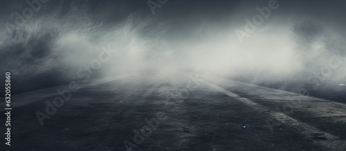 A mist-covered outdoor asphalt background giving a creative and blurry effect.