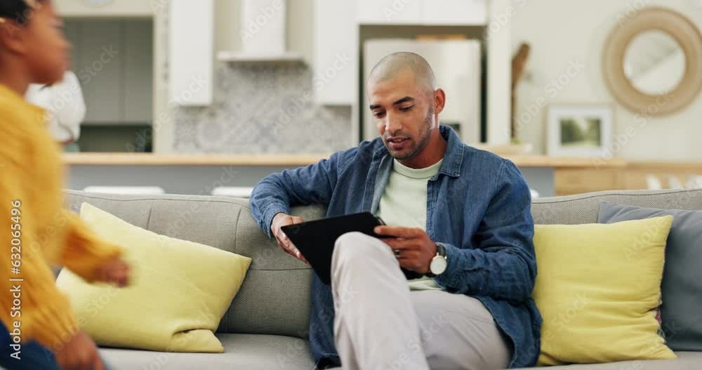 Father watching a video with his children on a tablet on a sofa in the living room at home. Bonding, love and young dad browsing on social media or the internet with girl kids on digital technology. Father watching a video with his children on a tablet on a sofa in the living room at home. Bonding, love and young dad browsing on social media or the internet with girl kids on digital technology.