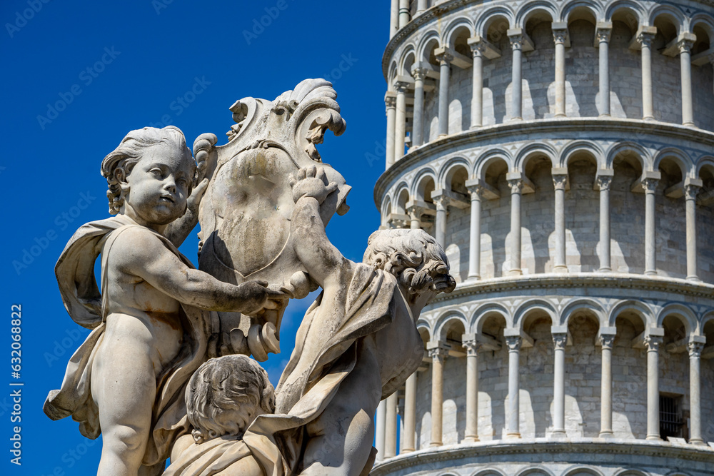 statue of pisa in italy with tower
