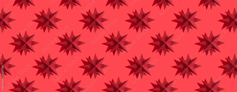Glitter red or magenta stars decoration pattern on red background with shadows. Red festive background. Winter minimal holiday postcard. New Year or Christmas minimal flat lay concept. Banner, header Glitter red or magenta stars decoration pattern on red background with shadows. Red festive background. Winter minimal holiday postcard. New Year or Christmas minimal flat lay concept. Banner, header