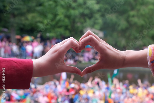 Love sign on the gay pride in Amsterdam photo