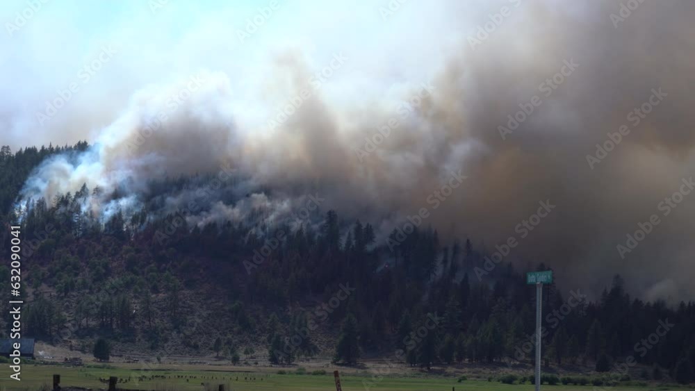 brush fire spreads through mountain terrain brush fire spreads through mountain terrain