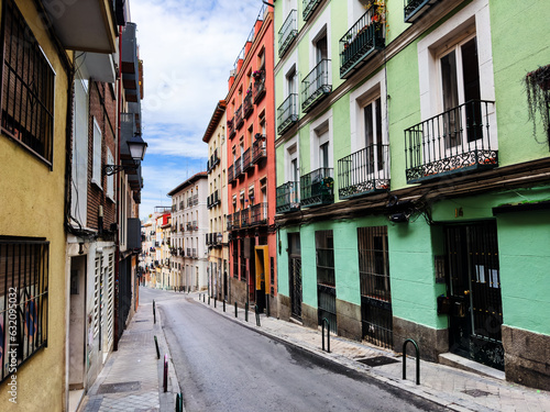 Typical street in old Madrid downtown with colorful houses © Sergey Novikov