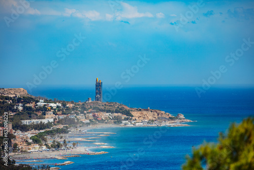 Fototapeta Naklejka Na Ścianę i Meble -  Mediterranean coastline in Malaga and tower of cement plant
