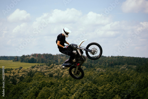 Extreme free ride motocross in fields.