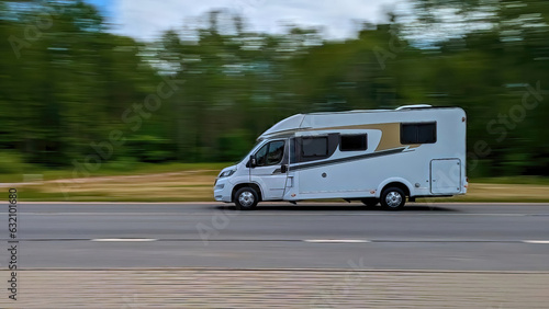 A vacation trip in a motorhome, a rest in a van. Blurred car.