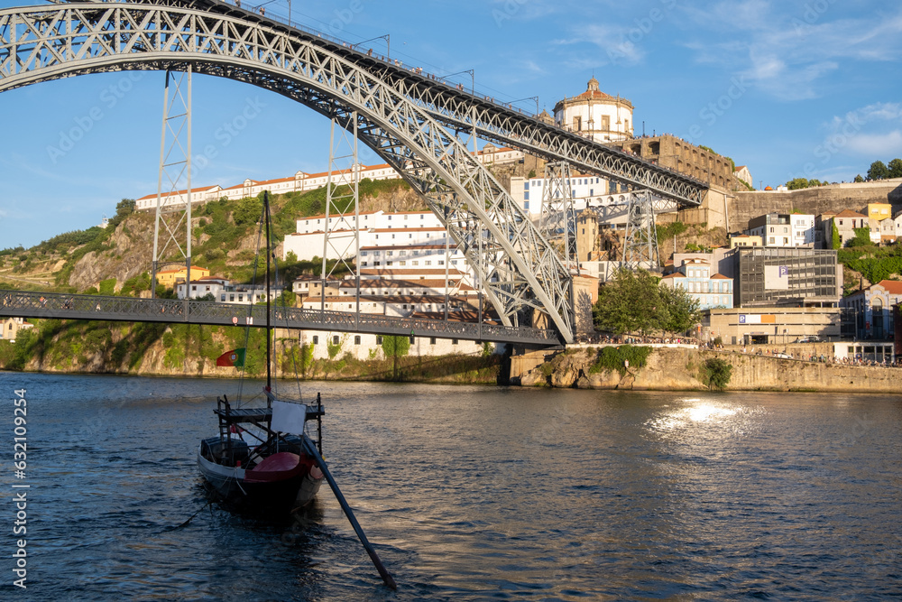 Fototapeta premium Porto urban skyline at sunset: The city of bridges and enchanting hills.