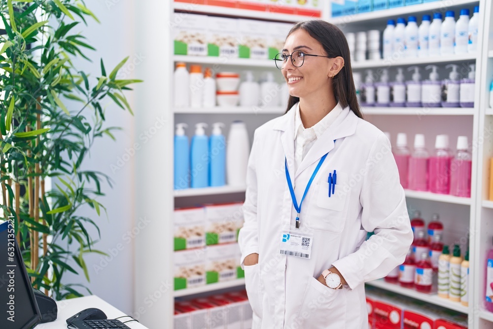 Young beautiful hispanic woman pharmacist smiling confident standing at pharmacy Young beautiful hispanic woman pharmacist smiling confident standing at pharmacy