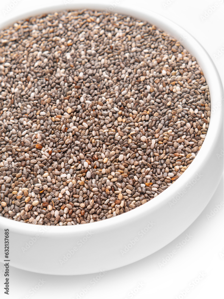 Chia seeds close-up in a white cup, vertical shot. Selective focus. Chia seeds close-up in a white cup, vertical shot. Selective focus.