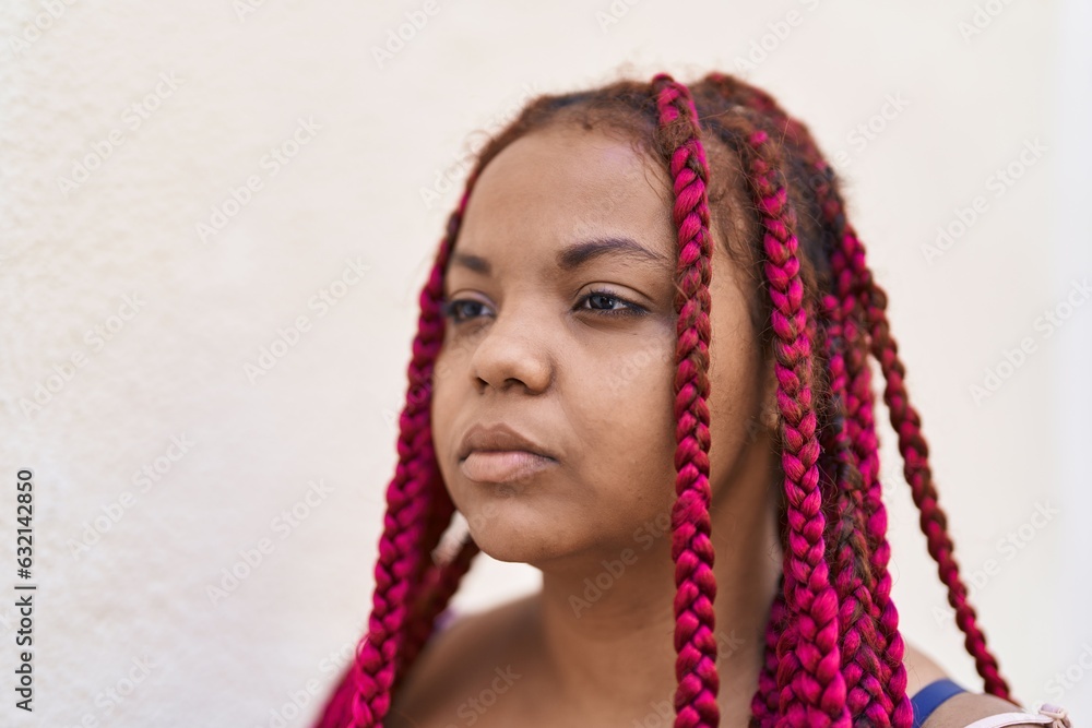 African american woman with relaxed expression standing at street African american woman with relaxed expression standing at street