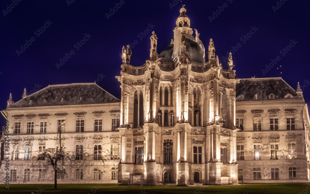Majestic architecture illuminated by street lights at dusk