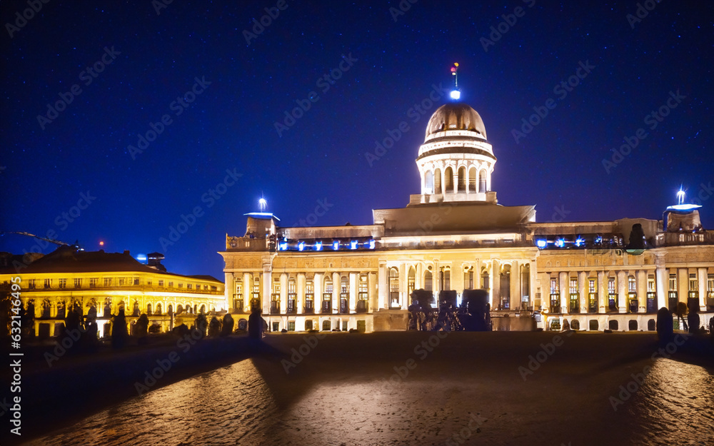 Majestic architecture illuminated by street lights at dusk