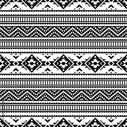 Geometric vector illustration design for fabric print and decoration. Seamless ethnic pattern. Tribal Aztec style. Black and white colors.