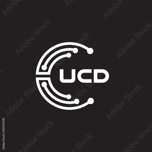 UCD letter technology logo design on black background. UCD creative initials letter IT logo concept. UCD setting shape design
 photo