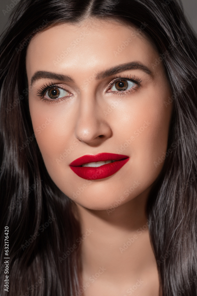Fototapeta premium Fashion portrait of caucasian young brunette woman with perfect hair styling and fresh healthy skin