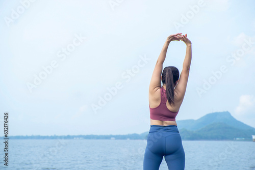 The asian woman do yoga in holiday time, on modern concept and healthy. Nature background with exercise and nature, female happiness concept