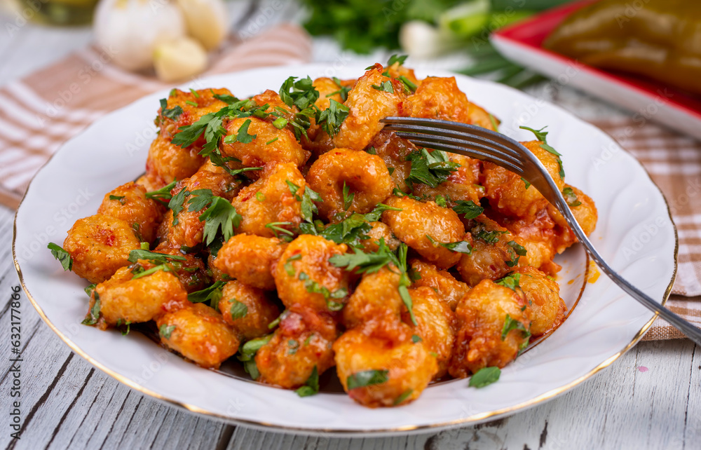 Traditional delicious Turkish food; bulgur garlic meatball (Turkish name; Sarimsakli bulgur kofte or Fellah koftesi) Traditional delicious Turkish food; bulgur garlic meatball (Turkish name; Sarimsakli bulgur kofte or Fellah koftesi)