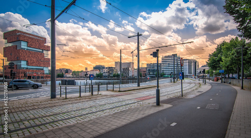 Street and tram track near modern small island in city center of Antwerp, Belgium. photo