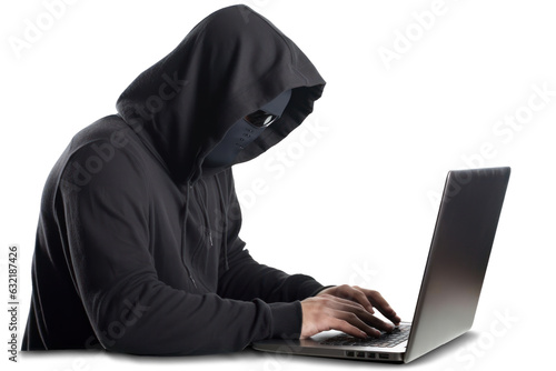 A hacker in black hoodie is working on his laptop.