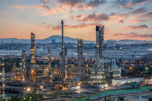 Photography Oil and Gas Industrial zone,The equipment of oil refining,Close-up of industrial pipelines of an oil-refinery plant,Detail of oil pipeline with valves in large oil refinery