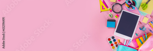 School equipment high-colored bright pink flat lay. Various school education and office supplies, accessories. Back to school sale background top view copy space