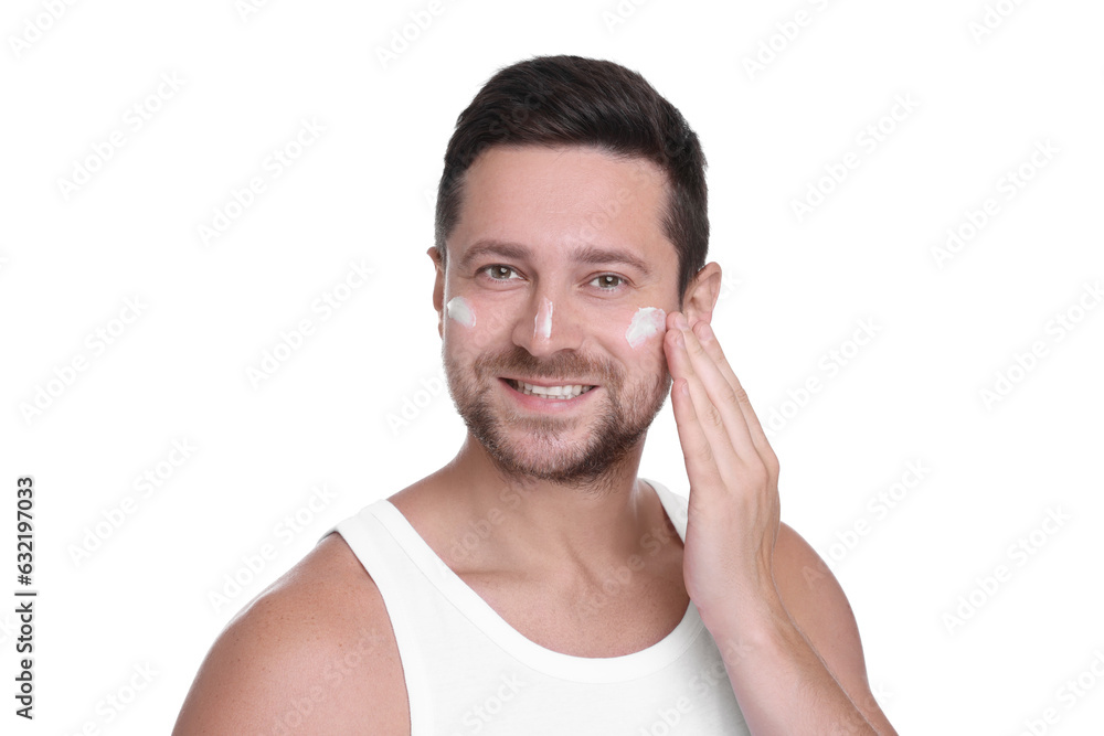 Man applying sun protection cream onto his face against white background Man applying sun protection cream onto his face against white background