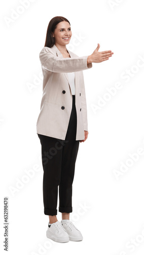 Beautiful young businesswoman in suit on white background