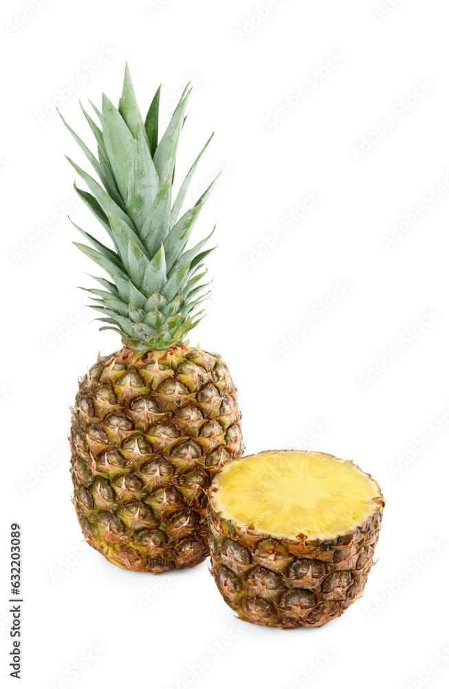 Whole and cut tasty ripe pineapples isolated on white Whole and cut tasty ripe pineapples isolated on white