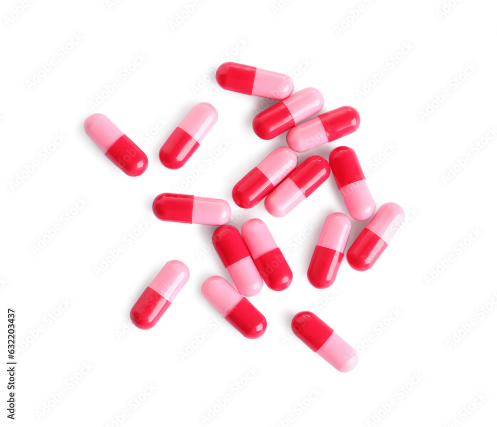 Many pink pills isolated on white, top view