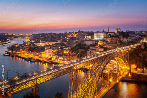 View to Porto over river Douro with reflection of the lights at night © ronnybas