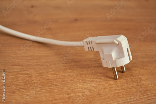 triple electrical extension cable on the floor photo