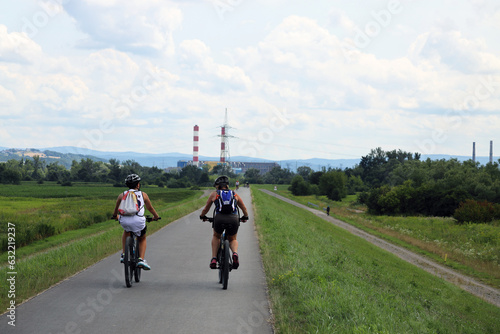 Cyclists on a bike path near Tynec, Poland. Actively spending time outdoors photo