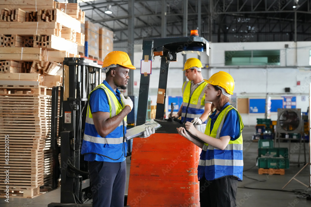 Storehouse workers are checking stock and inventory in retail warehouse. Business factory industry concept. Storehouse workers are checking stock and inventory in retail warehouse. Business factory industry concept.