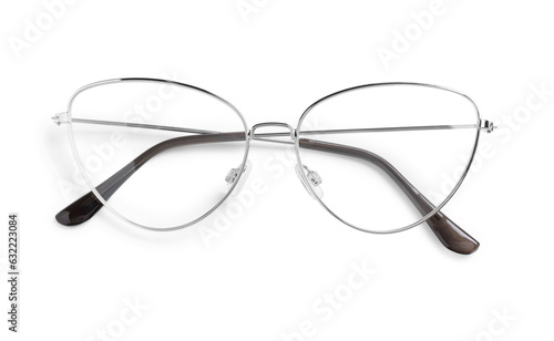 Stylish glasses with metal frame isolated on white, top view