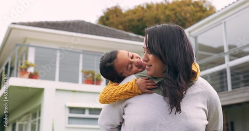 Kiss, piggyback and a mother with a child outdoor in a backyard with care, happiness and love. Woman and girl kid or happy family together for quality time, fun game and bonding or affection at home