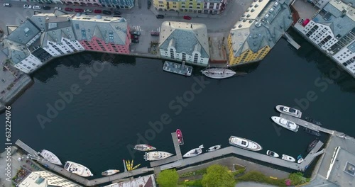 Top Down Aerial Drone View of City with Canal and Sailboats in Norway (Alesund)