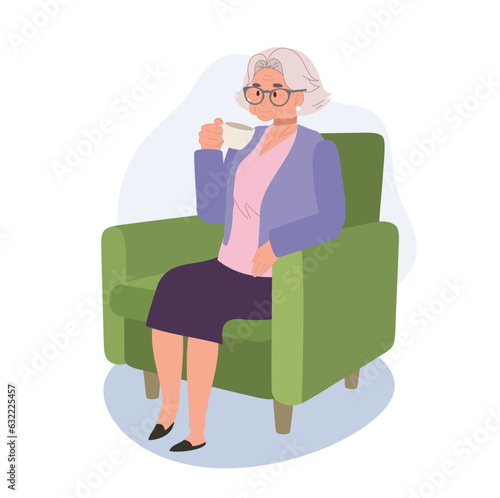 Cozy Tea Time concept. Senior Woman's relaxing and Enjoying Peaceful Tea Time on Couch.