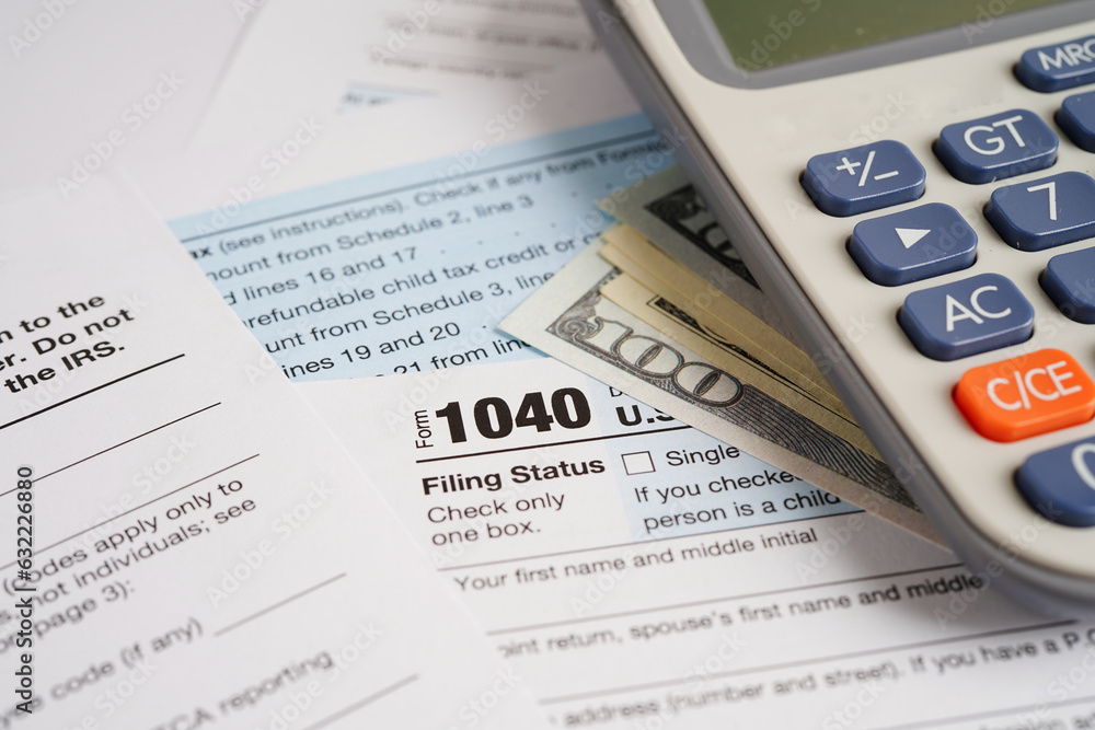 Tax form 1040 U.S. Individual Income Tax Return, business finance concept. Tax form 1040 U.S. Individual Income Tax Return, business finance concept.